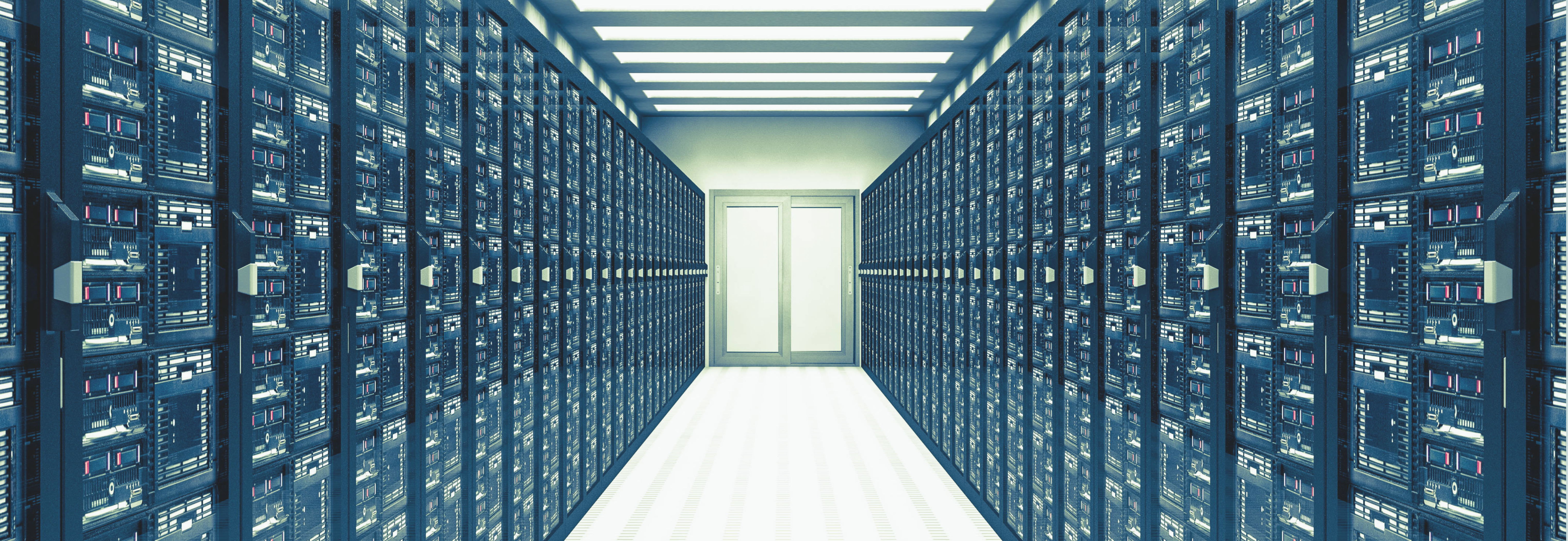 Data center with rows of racks leading to a door