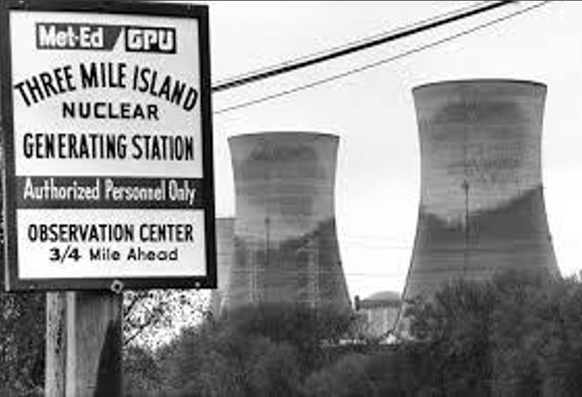 Three Mile Island Nuclear Generating Station sign and reactors